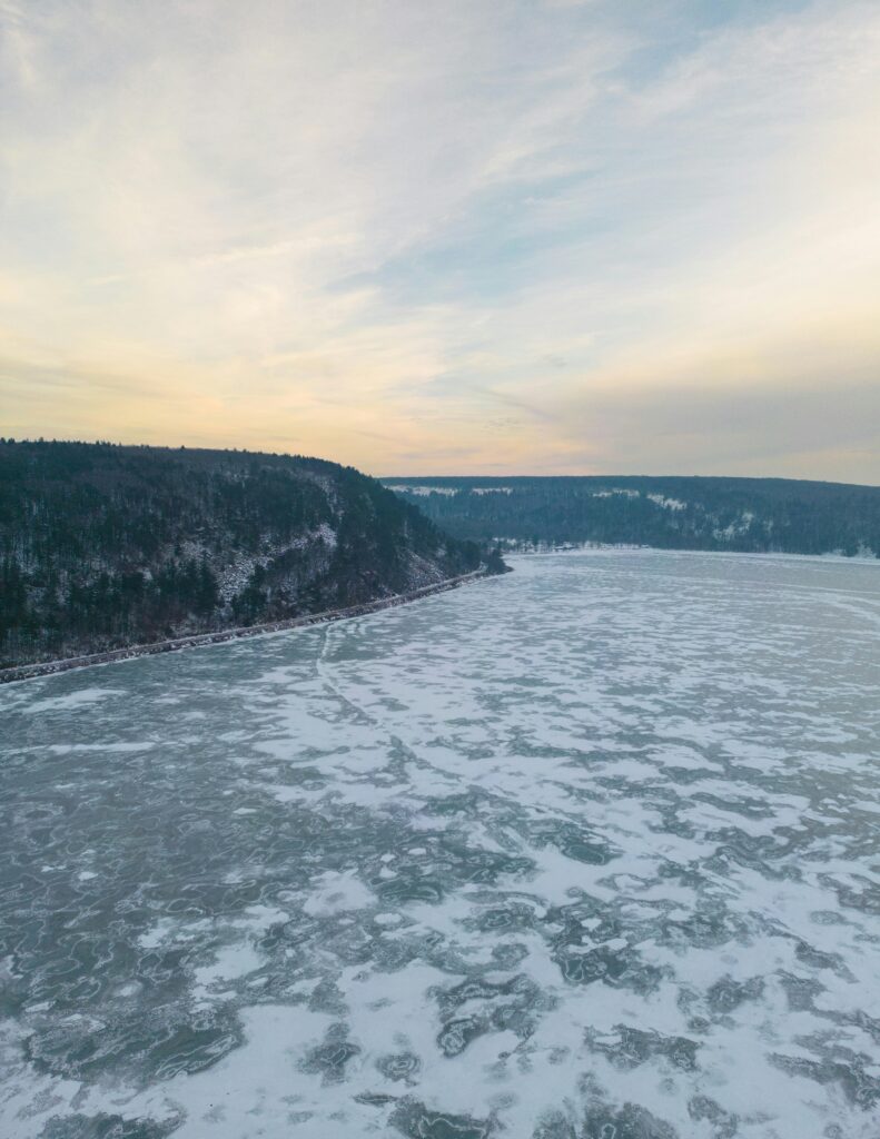 pexels-photo-16317909-16317909 Stunning aerial view of the frozen Devils Lake in North Dakota during winter.